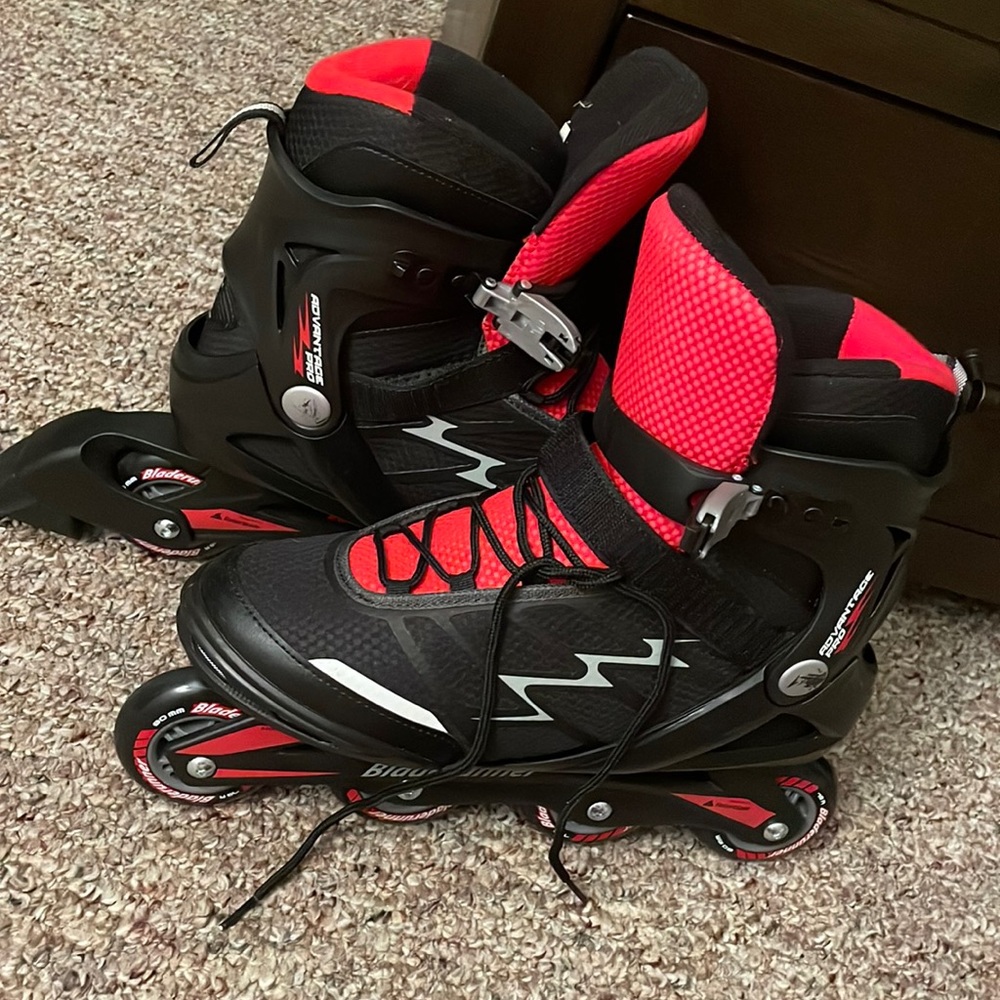 Men’s inline skates. Size 11. Red and black roller blades.